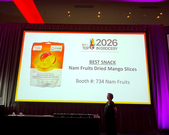 The Best Snack slide on the big screen at the GIC 2026 awards: Nam Fruits Dried Mango Slices, booth 734